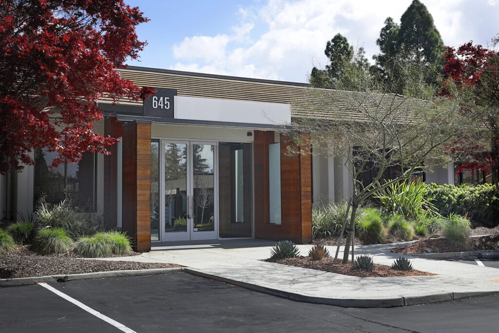 Renovated building exterior of Montague Oaks office park