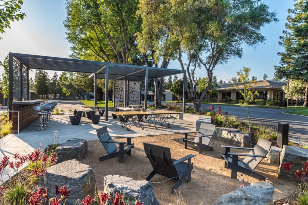 Outdoor amenity area with outdoor seating, tables and a countertop